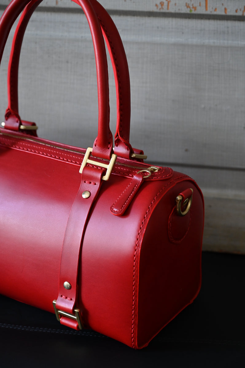 red-leather-weekender-bag